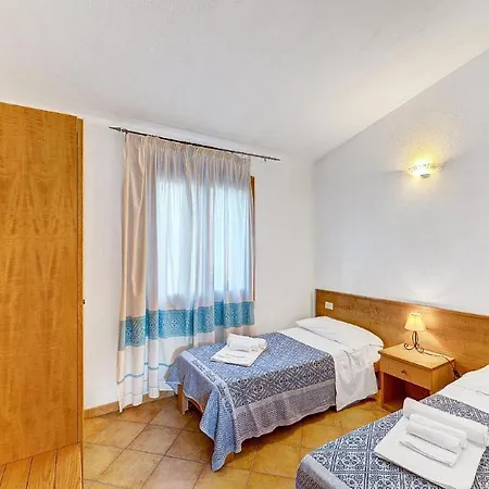 Апартаменты The Fantastic Residenza Badus Two Bedroom Sleeps Six